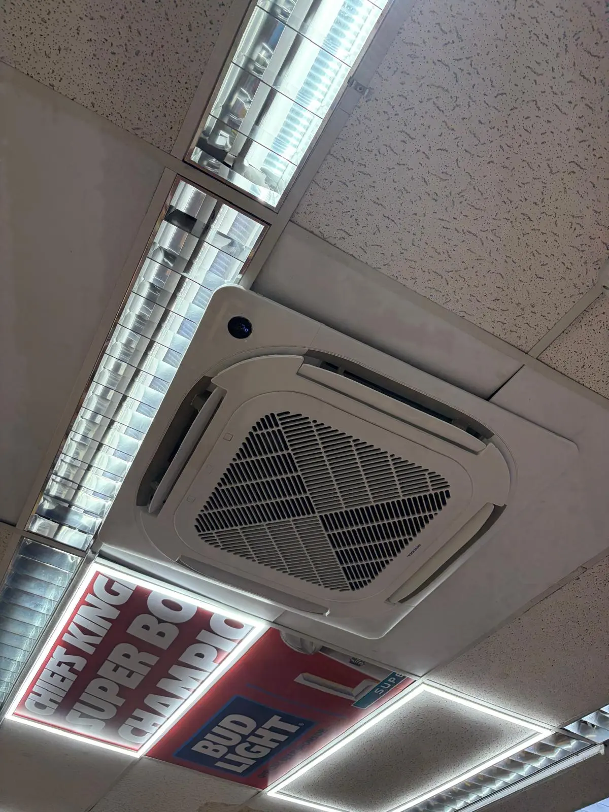 Commercial ceiling cassette indoor AC unit installation